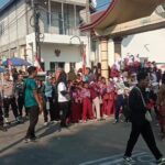 Peringati HUT ke-81 RI, Kapolsek dan Anggota Polsek Karangsembung Kawal Pengamanan Lomba Gerak Jalan Tingkat SD